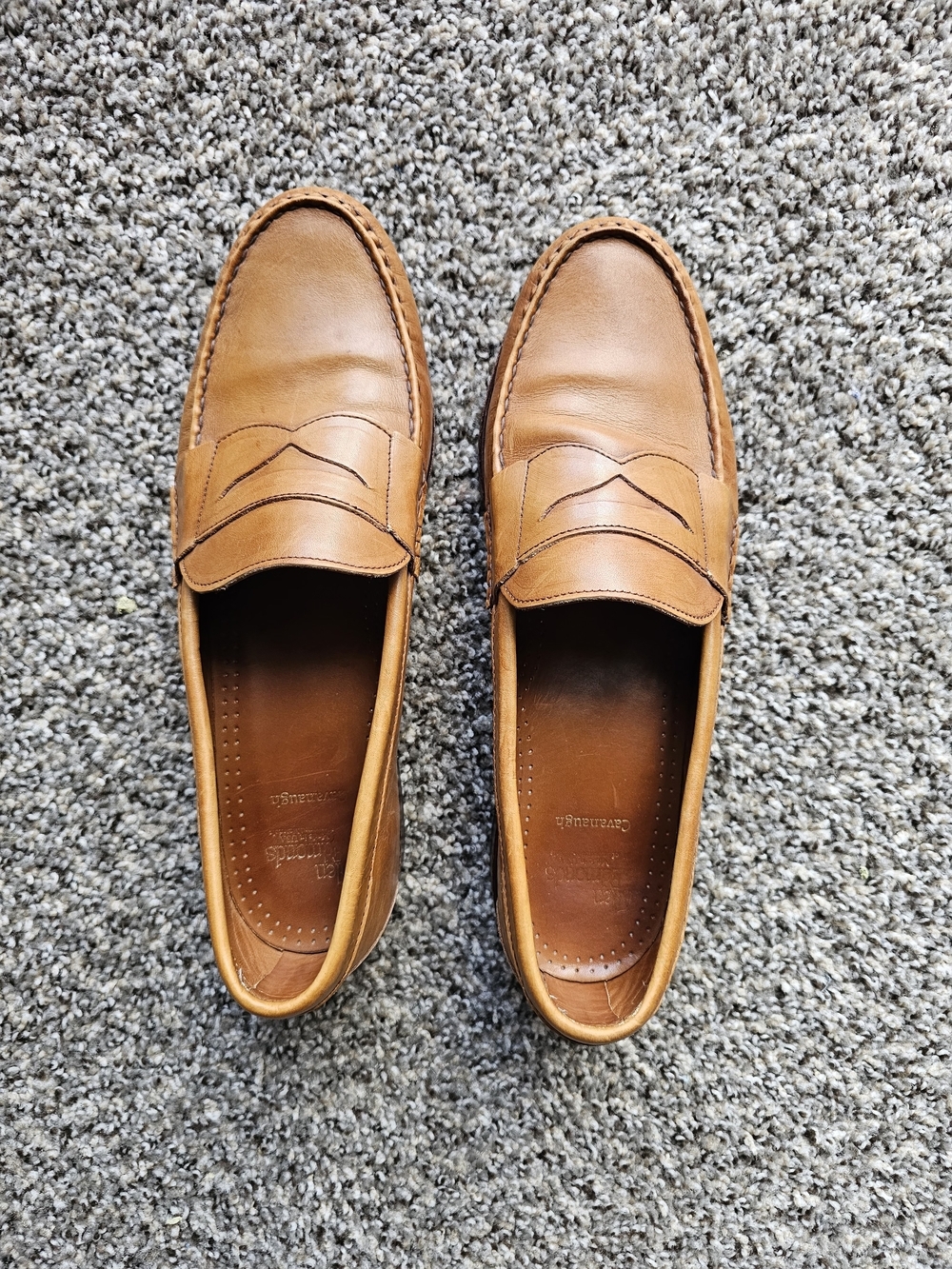 Allen Edmonds Cavanaugh leather penny loafers in a walnut tan color.